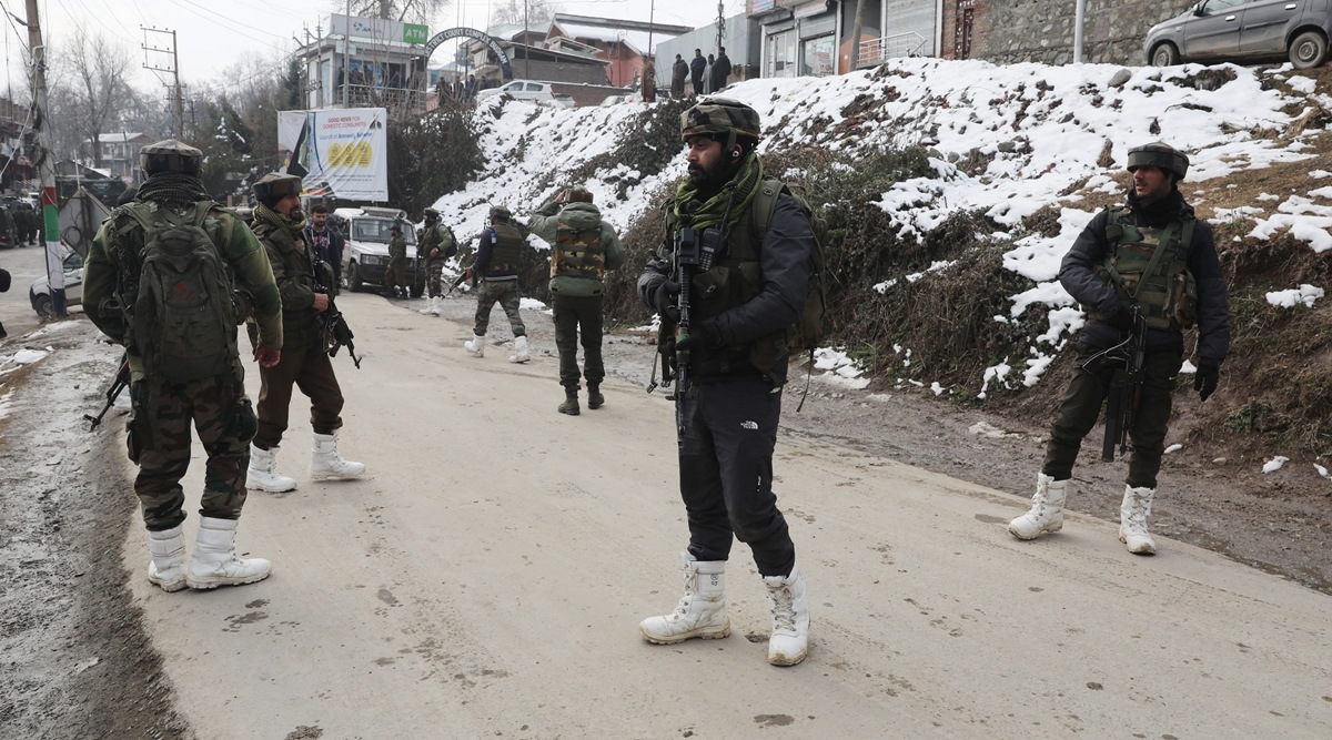Police and Army personnel at the encounter site near Court Complex in J&K's Budgam district on Tuesday. (Express Photo by Shuaib Masoodi)