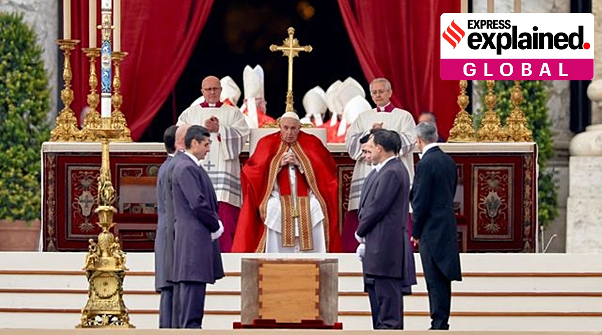 Pallbearers stand next to the coffin of former Pope Benedict during his funeral as Pope Francis presides over the ceremonies, in St. Peter's Square at the Vatican. (Reuters)