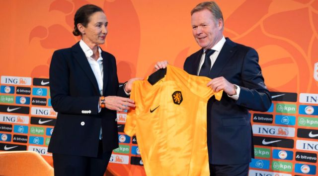 Marianne van Leeuwen, CEO of professional football, left, presents Ronald Koeman as coach of the Dutch men's soccer team prior to a press conference in Zeist, Netherlands, Monday, Jan. 23, 2023. (AP Photo/Peter Dejong)