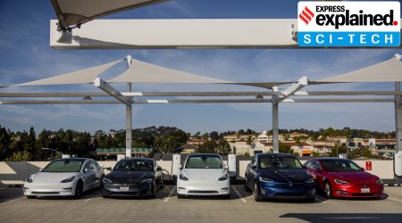 Tesla vehicles charge at the One Paseo mall in San Diego (Image credits: New York Times)