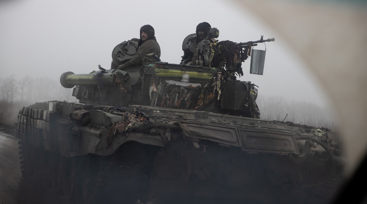 Ukrainian troops ride in a tank in the Bakhmut district of eastern Ukraine, where the city and outlying areas continue to come under Russian attack, in December last year. (New York Times)