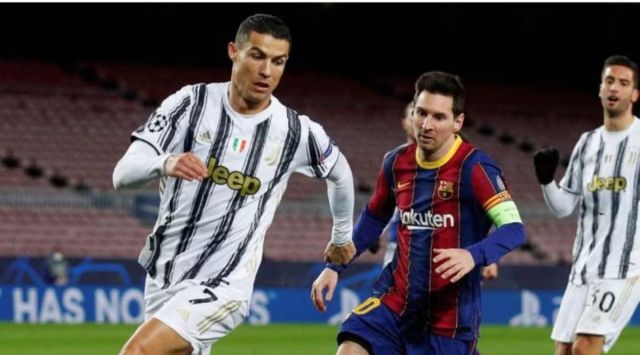 Lionel Messi in action with Cristiano Ronaldo. (FILE/Reuters)