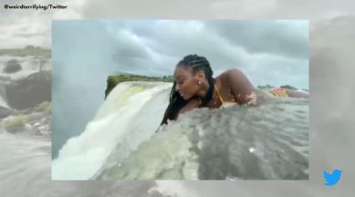 Victoria Falls in Zambia, hanging from the edge of victoria falls, adventure sports viral videos, people sit at the edge of victoria waterfalls, adrenaline-pumping sports, indian express