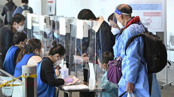 Virus Outbreak China Japan