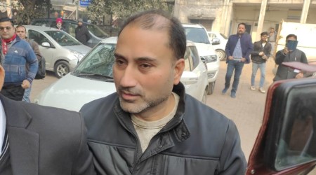 Inderjit Singh Indi while surrendering at the vigilance office in Ludhiana on Monday.