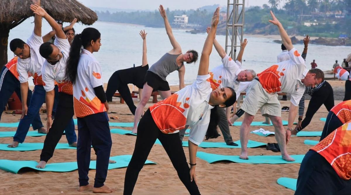 G20 health delegates practise yoga on beach in Kerala India News