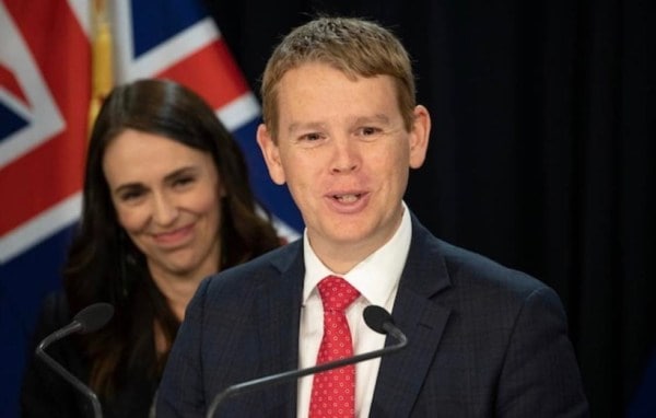 Outgoing New Zealand Prime Minister Jacinda Ardern looks on as Chris Hipkins speaks. 