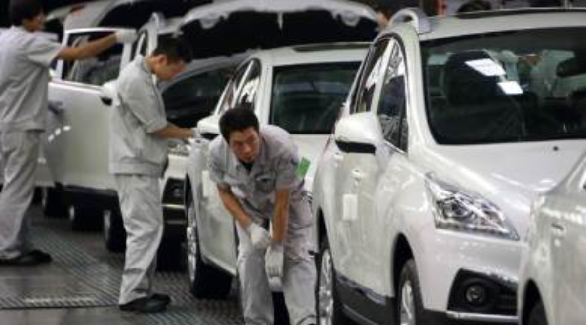 China passenger vehicle sales rise in Dec, Tesla sales slump 41%: Data