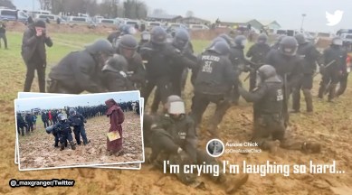 Lützerath Germany, Germany coal mine protests, viral video Germany coal mine protest, riot police in Germany Lützerath gets stuck in mud, climate protests viral video, indian express