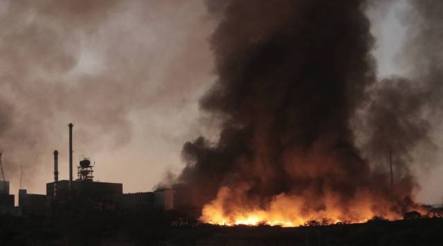 Atleast four fire engines and five tankers were sent to the spot for fire fighting operations . (Express Photo)