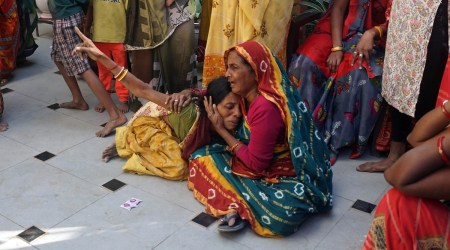 The family of the boy has alleged foul play and claimed that the owner of the house where the boy was employed as domestic help had been torturing him. (Express Photo by Bhupendra Rana)
