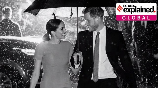 Meghan and Harry pictured under an umbrella