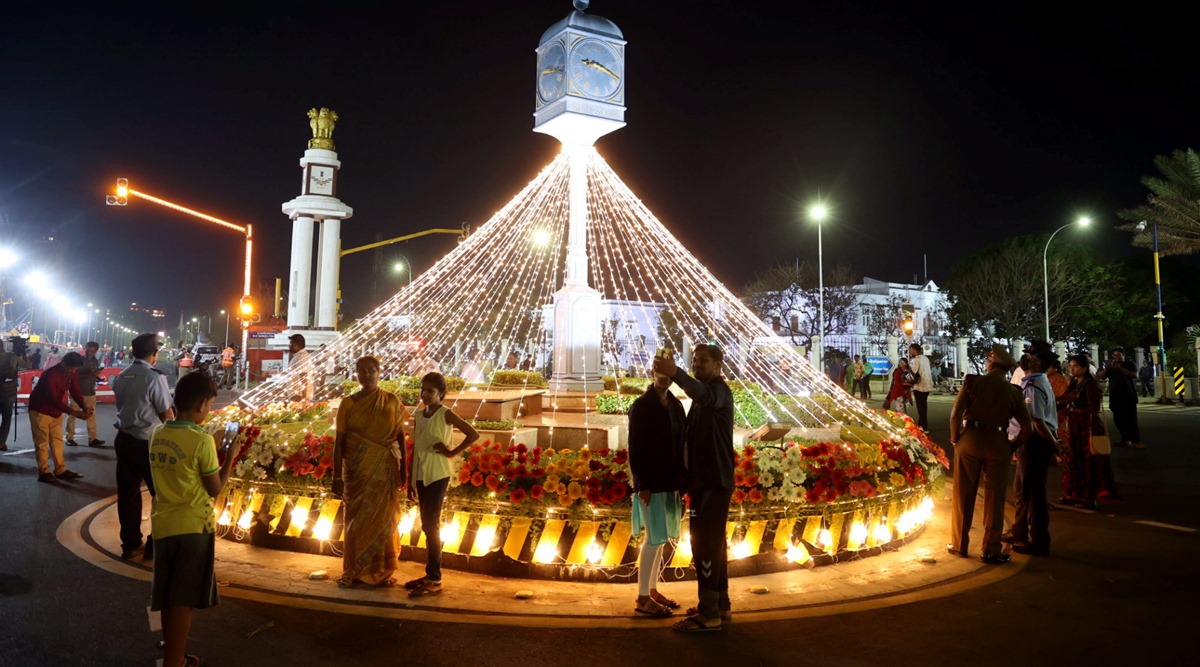 People gather at the Marina beach to celebrate the New Year 2023, in Chennai, Saturday night (PTI)