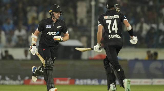 New Zealand's Michael Bracewell, left, and Mitchell Santner run between the wickets to score during the first one-day international cricket match between India and New Zealand in Hyderabad, India, Wednesday, Jan. 18, 2023. (AP Photo/Mahesh Kumar A.)