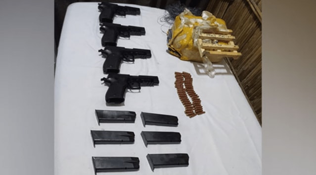 Weapons and ammunition seized by the BSF along the international border in Punjab. (ANI Photo)