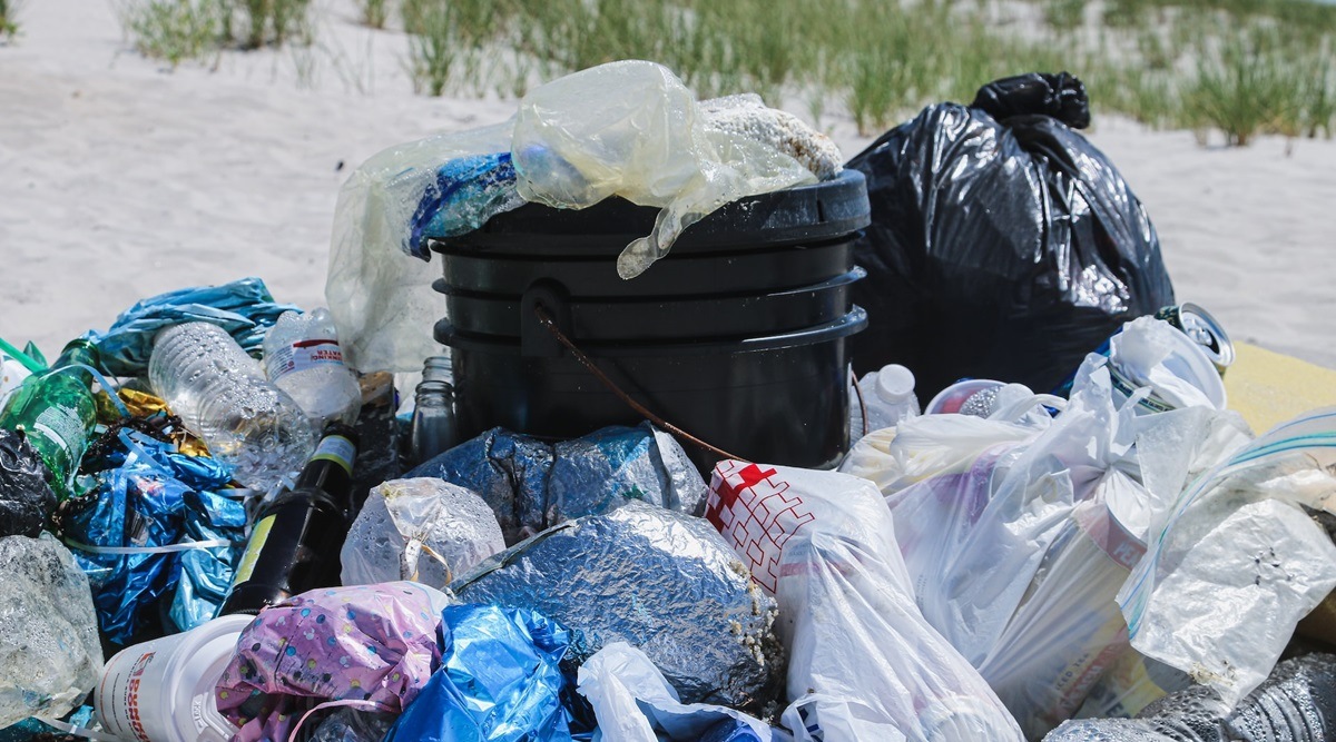 plastic bags gather at a landfill
