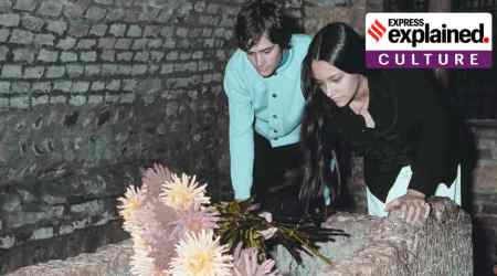 Olivia Hussey and Leonard Whiting, who are playing the title roles in Franco Zeffirelli's "Romeo and Juliet," place flowers on the "Tomba di Giulietta", or the Tomb of Juliet, in Verona, northern Italy, on Oct. 22, 1968. (AP Photo/File)