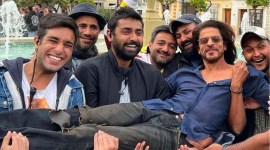 Shah Rukh Khan in a candid moment with Pathaan crew. (Photo: Rajvir Ashar/Instagram)