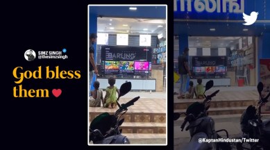 electronics store manager allows homeless kids to select TV show, viral kindness videos, TV store employee street kids, acts of kindness, homeless kids in India, indian express