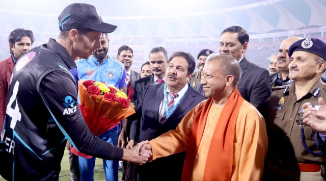 Hardik Pandya with CM Yogi Adityanath during the second T20 cricket match between India and New Zealand at Atal Bihari Vajpayee Ekana stadium, in Lucknow, Sunday. (Express Photo)