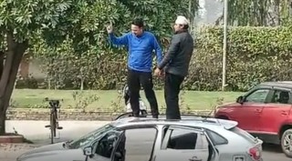 AAP Councillor dances atop a car Punjab