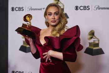 Adele Wore Louis Vuitton To The 2023 Grammy Awards - Red Carpet Fashion  Awards