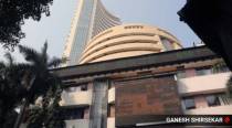 Equities, rupee trade with gains as RBI hikes repo rate
