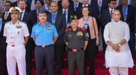 Defence Minister Rajnath Singh with CDS Gen Anil Chauhan, Air Chief VR Chaudhari and Navy Chief Admiral R Hari Kumar at Aero India in Bengaluru, Monday no alt set