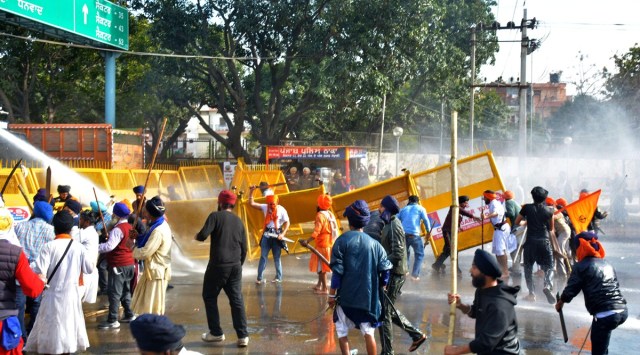 During the clash between Chandigarh Police and the Quami Insaaf Morcha at Sector 52- 53, Chandigarh border, and (right) an injured police personnel on Wednesday. (Express Photo)