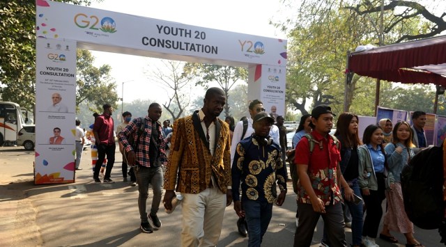 Delegates arrive at Maharaja Sayajirao University to attend the Youth 20 India Summit on Saturday. Bhupendra Rana  (Express Photo)
