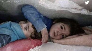 Seven-year-old girl protects little brother under rubble, moving photograph  melts hearts online | Trending News - The Indian Express