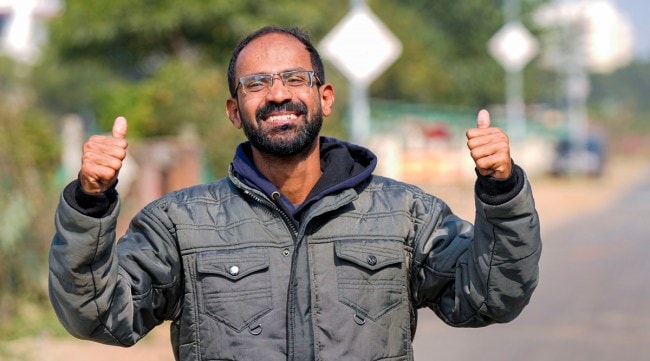 Journalist Sidheeque Kappan poses for photos following his release from the Lucknow District Jail, in Lucknow. (PTI)