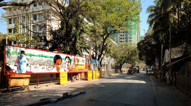 The road in front of Uddhav Thackeray’s residence ‘Matoshree’ wears a deserted look on Sunday. (Express photo by Amit Chakravarty)