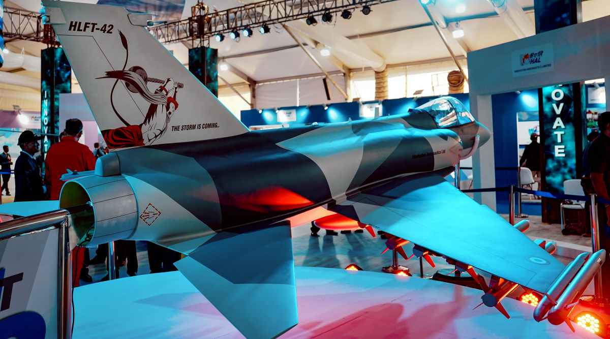 The tail of HAL's fighter aircraft with a portrait of Lord Hanuman in a pose striking with his mace with a message, 'The storm is coming' displayed during the inauguration of Aero India 2023, at Yelahanka air base in Bengaluru, Monday, Feb. 13, 2023. (PTI Photo)