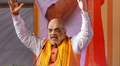 Union Minister and senior BJP leader Amit Shah addresses a public rally at Sandur in Bellary district
