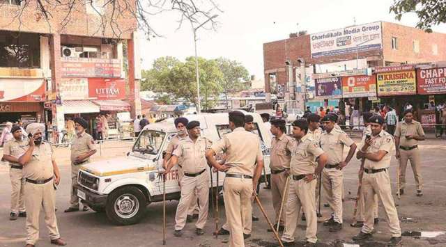 The protesters, after being stopped, squat at the spot reciting kirtans for hours, before eventually returning to their protest base at Gita Bhawan in Sector 53. (Express Photo)