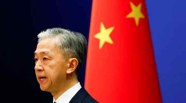Chinese Foreign Ministry spokesperson Wang Wenbin speaks during a news conference in Beijing, China March 3, 2022. (REUTERS/Carlos Garcia Rawlins)