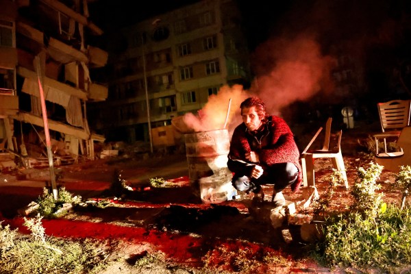 People react after a quake in Antakya in Hatay province, Turkey