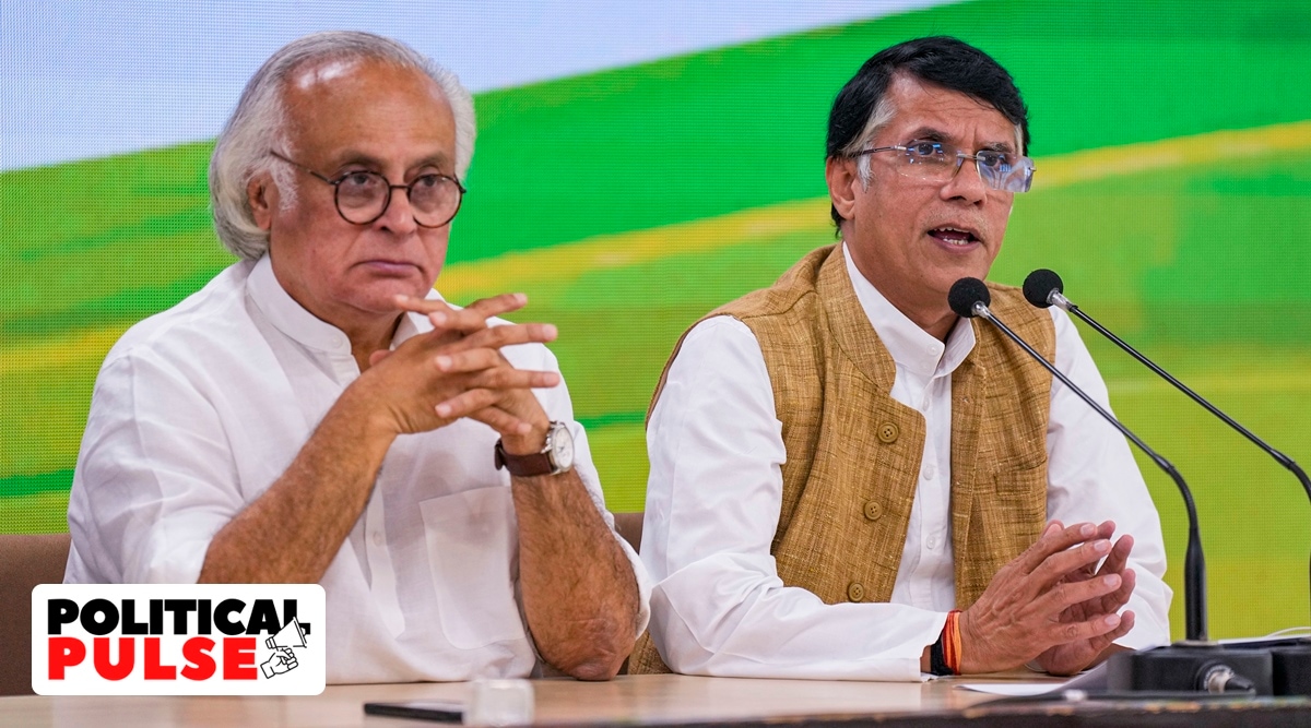 Congress leader Pawan Khera with party leader Jairam Ramesh addresses a press conference at AICC headquarters, in New Delhi, Monday, Feb. 20, 2023. (PTI Photo)