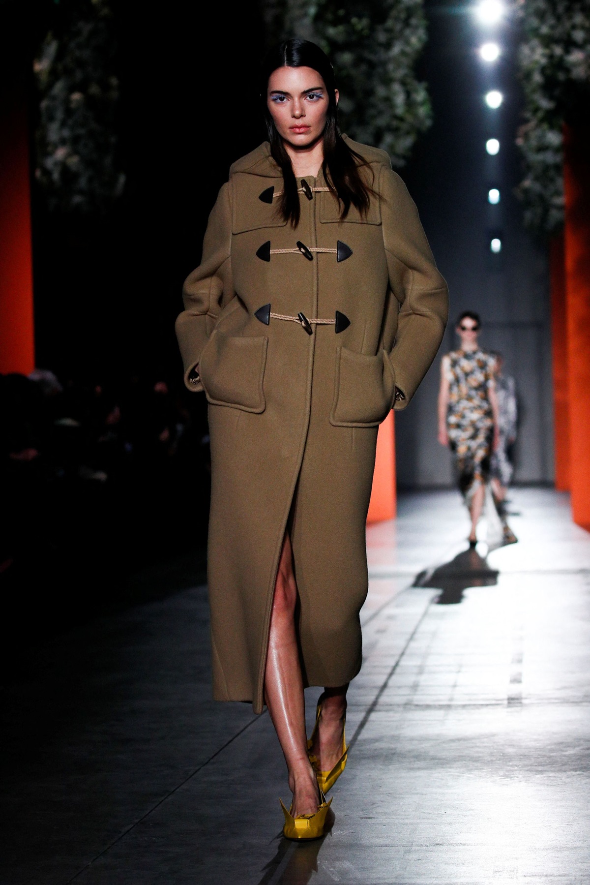 Kendall Jenner Walked the Prada Show in a Giant Puffer Coat and See-Through  Skirt