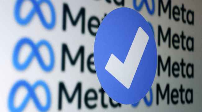A blue verification badge and Meta logos are seen in this illustration taken January 19, 2023. (Photo: REUTERS/Illustration)