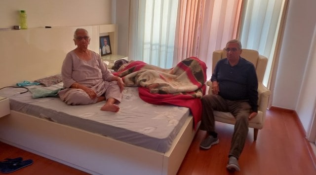 Vijay Kumar Grover and his mother have been put up by the builder in a vacant flat in the same society