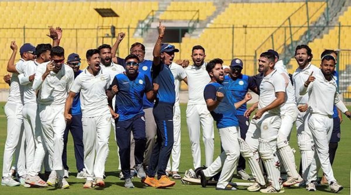 Bengaluru: Saurashtra team coach Sitanshu Kotak, captain Arpit Vasavada with players celebrate after the team wins the 2nd semi final of Ranji Trophy match against Karnataka, at Chinnaswamy Stadium in Bengaluru, Sunday, Feb. 12, 2023.