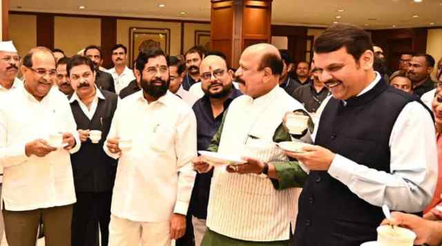 CM Eknath Shinde and
Dy CM Devendra Fadnavis along with other fellow Ministers of the Cabinet at the Tea Party organized on the eve of the Legislature Budget Session 2023. (@mieknathshinde/Twitter screen grab)