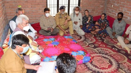 L-G Manoj Sinha during a previous meeting with families of three Rajouri youths who were killed in an encounter. (File Photo)