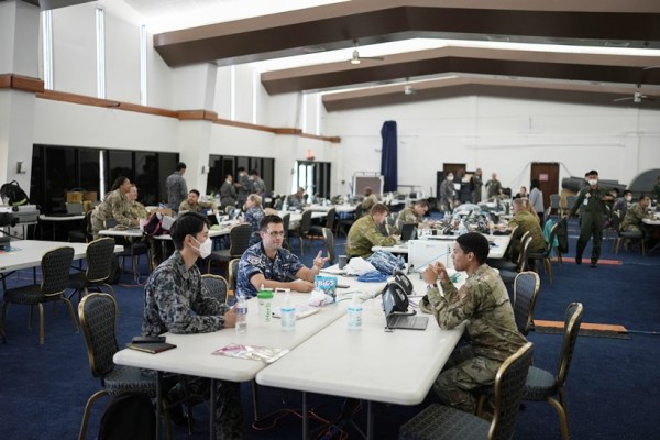 American, Australian and Japanese military teams collaborate during a joint drill at Andersen Air Force Base, on Feb. 17, 2023. Rattled by China’s military buildup and territorial threats — along with Russia’s war of aggression in Ukraine and doubts about U.S. resolve — nations across the region are bolstering defense budgets, joint training, weapons manufacturing and combat-ready infrastructure. (Chang W. Lee/The New York Times)