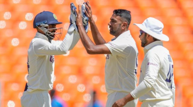 India's Ravichandran Ashwin, center, celebrate with his teammates dismissal of Australia's Alex Carey during the second day of the fourth cricket test match between India and Australia in Ahmedabad, India, Friday, March 10, 2023. (AP Photo/Ajit Solanki)