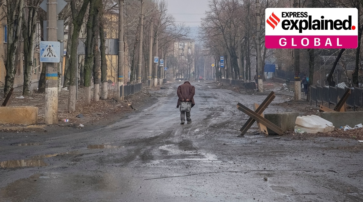 A local resident walks at empty street in Bakhmut