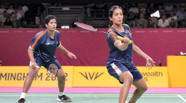 Treesa Jolly, left, and Gayatri Gopichand Pullela of India in action