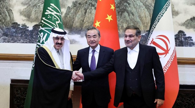Wang Yi, a member of the Political Bureau of the Communist Party of China Central Committee and director of the Office of the Central Foreign Affairs Commission, Ali Shamkhani, the secretary of Iran’s Supreme National Security Council, and Minister of State and national security adviser of Saudi Arabia Musaad bin Mohammed Al Aiban pose for pictures during a meeting in Beijing, China, March 10, 2023. (China Daily via REUTERS)